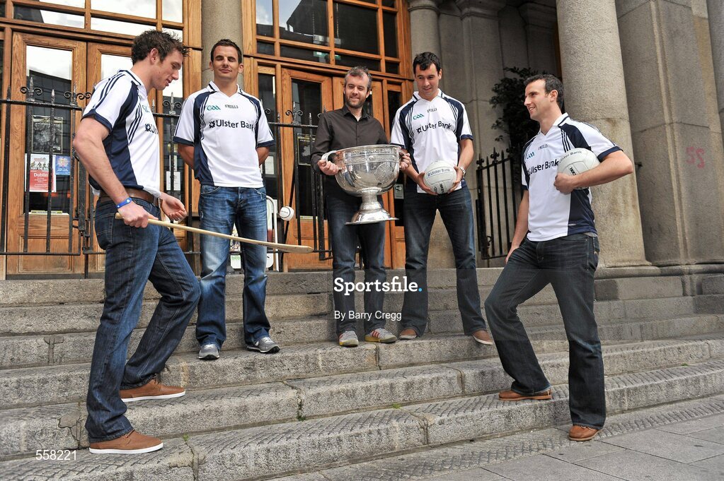 12 September 2011; Ulster Bank GAA stars, from left to right, 2011 All-Ireland medal winner Michael Fennelly, Down footballer Danny Hughes, Newstalk 106-108fm presenter Eoin McDevitt, with the Sam Maguire cup, Galway footballer Finian Hanley and Galway footballer Joe Bergin, at the 2011 ‘Off the Ball Roadshow with Ulster Bank’ finale. The Ulster Bank GAA stars were out in force, alongside a host of sporting greats, as the finale of the 2011 ‘Off the Ball Roadshow with Ulster Bank’ took over the Odeon Bar on Dublin’s Harcourt Street on Monday, 12th September. For the third year running, Ulster Bank teamed up with Newstalk 106-108 fm to take Ireland’s most popular sports programme on a tour across the country, where rival Ulster Bank GAA stars have featured in live shows in Kerry, Cork, Donegal, Limerick, Tipperary, Galway and Roscommon, throughout the summer. This year also saw the introduction of a major new club focused initiative – ‘Ulster Bank GAA Force’. The initiative was set up to support local GAA clubs across the country by giving them the opportunity to refurbish and upgrade their facilities. The Odeon Bar, Harcourt Street, Dublin. Picture credit: Barry Cregg / SPORTSFILE