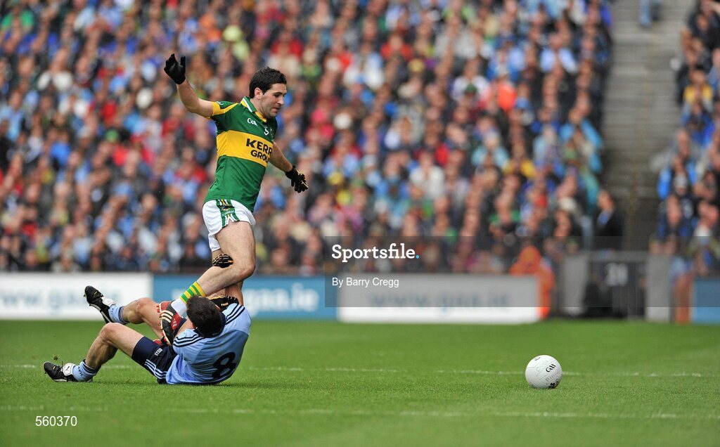 18 September 2011; Denis Bastick, Dublin, fouls Bryan Sheehan, Kerry. GAA Football All-Ireland Senior Championship Final, Kerry v Dublin, Croke Park, Dublin. Picture credit: Barry Cregg / SPORTSFILE