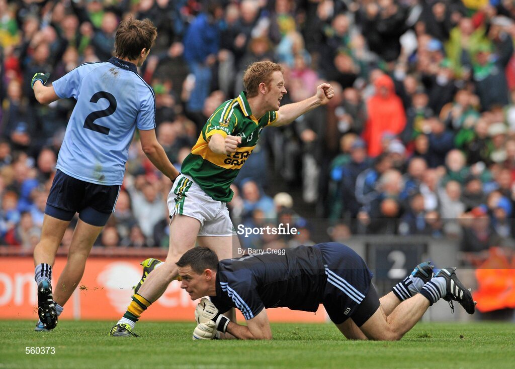 18 September 2011; Colm Cooper, Kerry, celebrates after scoring his side's first goal aagainst Dublin's Stephen Cluxton and Michael Fitzsimons. GAA Football All-Ireland Senior Championship Final, Kerry v Dublin, Croke Park, Dublin. Picture credit: Barry Cregg / SPORTSFILE