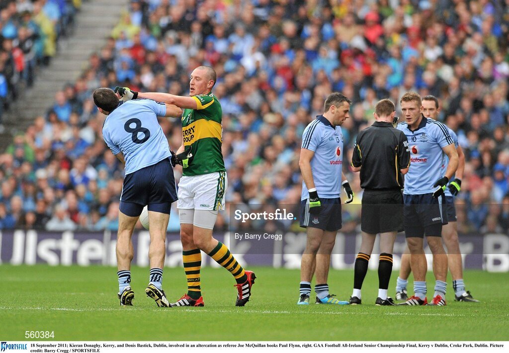 18 September 2011; Kieran Donaghy, Kerry, and Denis Bastick, Dublin, involved in an altercation as referee Joe McQuillan books Paul Flynn, right. GAA Football All-Ireland Senior Championship Final, Kerry v Dublin, Croke Park, Dublin. Picture credit: Barry Cregg / SPORTSFILE