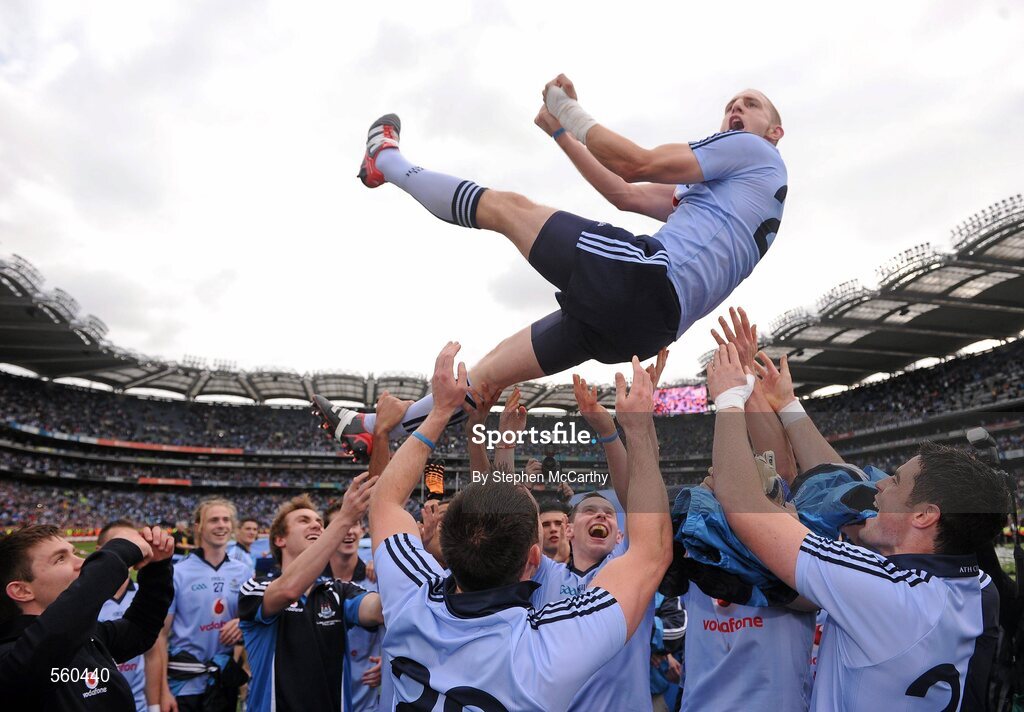18 September 2011; Eoghan O'Gara, Dublin, is thrown in the air by team-mates following their victory. GAA Football All-Ireland Senior Championship Final, Kerry v Dublin, Croke Park, Dublin. Picture credit: Stephen McCarthy / SPORTSFILE