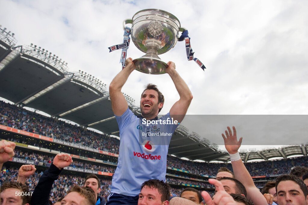 18 September 2011; Dublin captain Bryan Cullen lifts the Sam Maguire cup as he is raised shoulder high in front of Hill 16 as the Dublin team celebrate at the end of the game. GAA Football All-Ireland Senior Championship Final, Kerry v Dublin, Croke Park, Dublin. Picture credit: David Maher / SPORTSFILE
