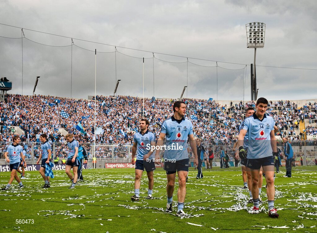 18 September 2011; Dublin players Diarmuid Connolly, right, Denis Bastick, centre, and Bryan Cullen, left, make their way from Hill 16 as they celebrate victory after the game. GAA Football All-Ireland Senior Championship Final, Kerry v Dublin, Croke Park, Dublin. Picture credit: Barry Cregg / SPORTSFILE