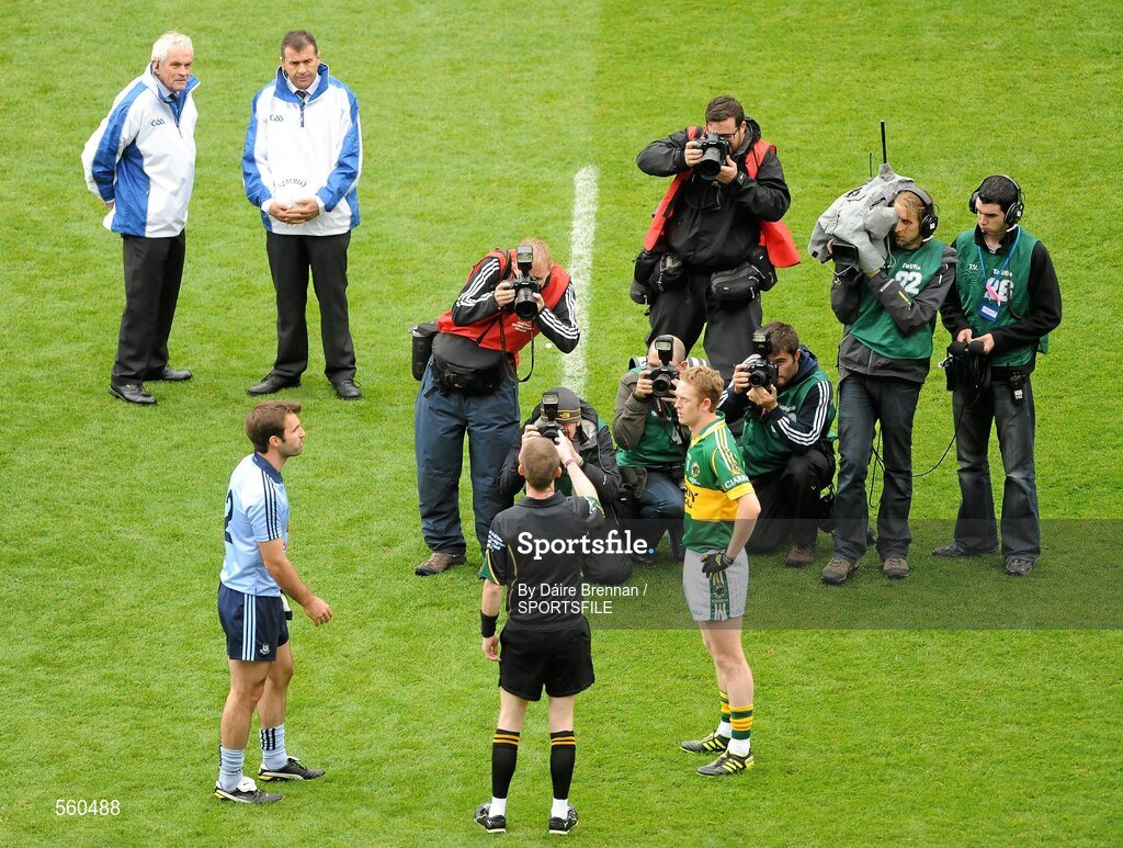 18 September 2011; Referee Joe McQuillan performs the coin-toss with Dublin captain Bryan Cullen and Kerry captain Colm Cooper. GAA Football All-Ireland Senior Championship Final, Kerry v Dublin, Croke Park, Dublin. Picture credit: Dáire Brennan / SPORTSFILE