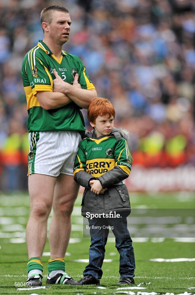 18 September 2011; A dejected Tomás Ó Sé, Kerry, with his son Michael, aged 5, after the game. GAA Football All-Ireland Senior Championship Final, Kerry v Dublin, Croke Park, Dublin. Picture credit: Barry Cregg / SPORTSFILE