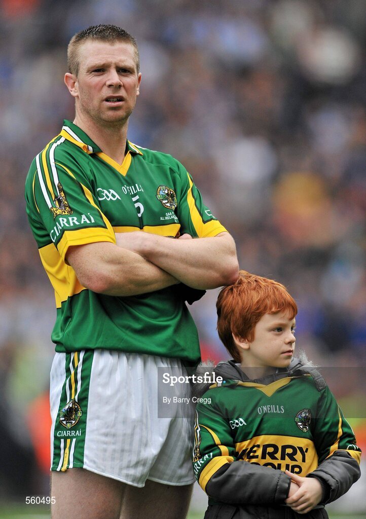 18 September 2011; A dejected Tomás Ó Sé, Kerry, with his son Michael, aged 5, after the game. GAA Football All-Ireland Senior Championship Final, Kerry v Dublin, Croke Park, Dublin. Picture credit: Barry Cregg / SPORTSFILE