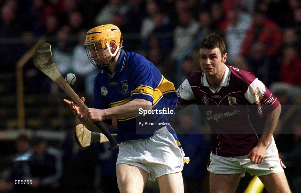 14 April 2002; Lar Corbett of Tipperary is tackled by Richie Murray of Galway during the Allianz National Hurling League Quarter-Final match between Galway and Tipperary at Semple Stadium in Thurles, Tipperary. Photo by Brian Lawless/Sportsfile