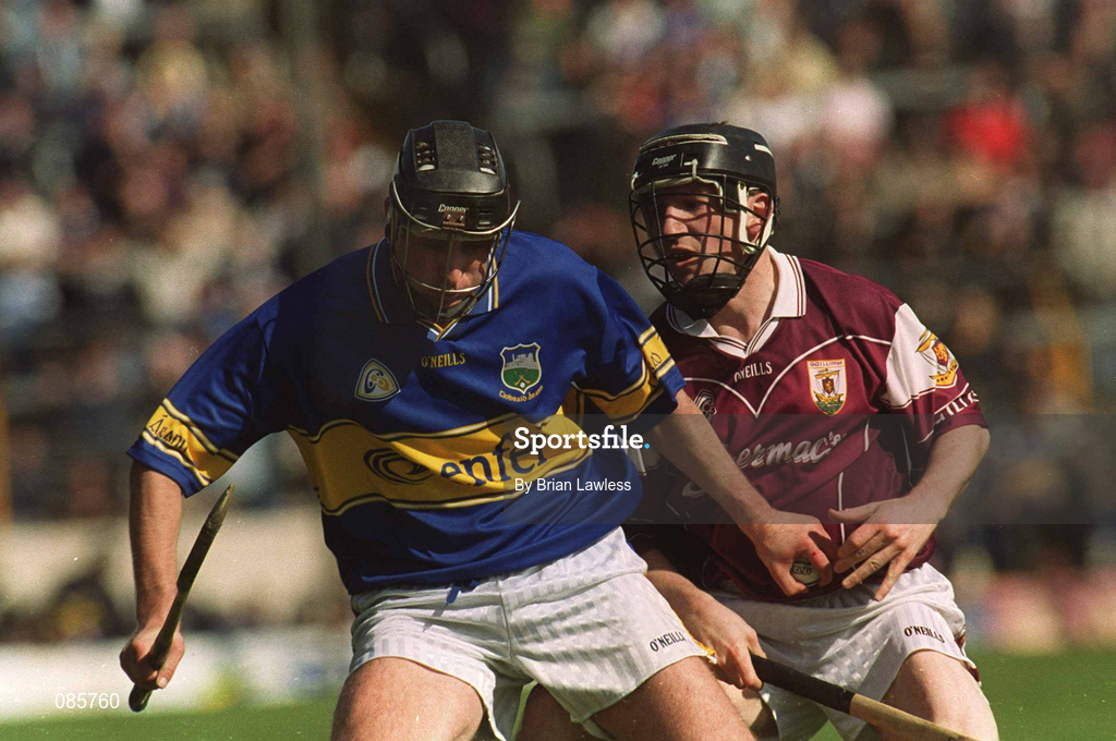 14 April 2002; Eddie Enright of Tipperary is tackled by Francis Forde of Galway during the Allianz National Hurling League Quarter-Final match between Galway and Tipperary at Semple Stadium in Thurles, Tipperary. Photo by Brian Lawless/Sportsfile