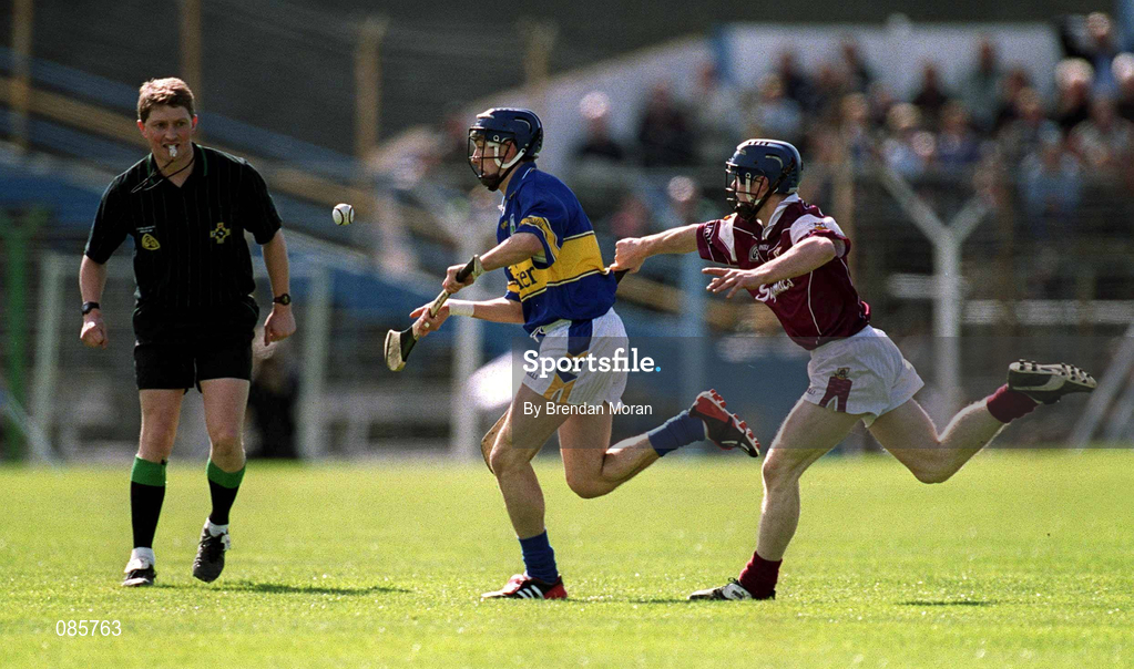 14 April 2002; Lar Corbett of Tipperary in action against Damien Hayes of Galway during the Allianz National Hurling League Quarter-Final match between Galway and Tipperary at Semple Stadium in Thurles, Tipperary. Photo by Brendan Moran/Sportsfile