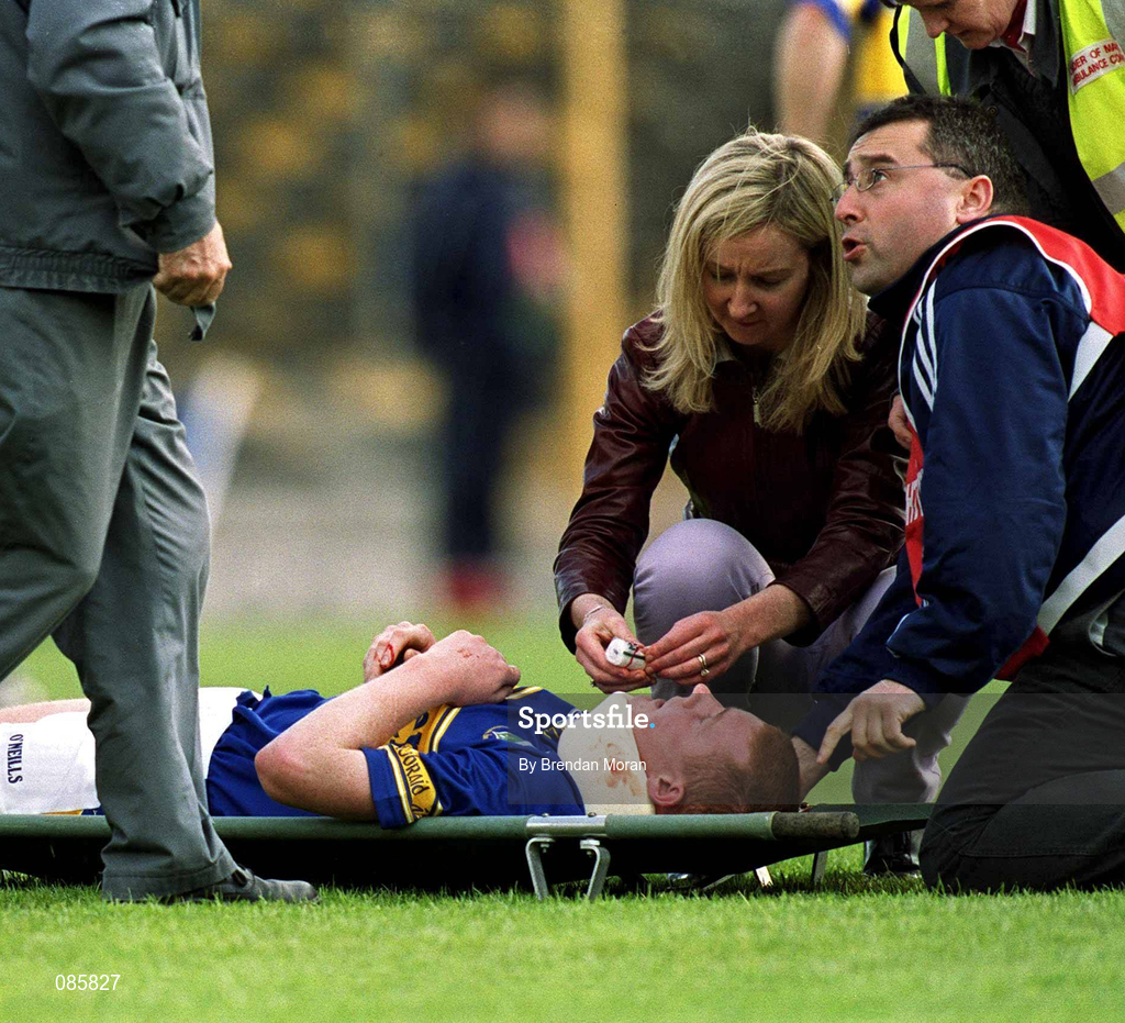 14 April 2002; Eamonn Corcoran of Tipperary is attended to by medical staff before being stretchered off during the Allianz National Hurling League Quarter-Final match between Galway and Tipperary at Semple Stadium in Thurles, Tipperary. Photo by Brendan Moran/Sportsfile