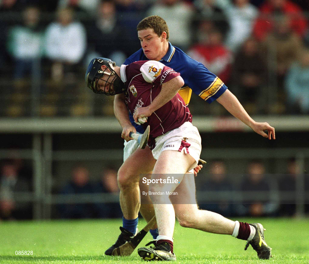 14 April 2002; Liam Hodgins of Galway in action against John Carroll of Tipperary during the Allianz National Hurling League Quarter-Final match between Galway and Tipperary at Semple Stadium in Thurles, Tipperary. Photo by Brendan Moran/Sportsfile