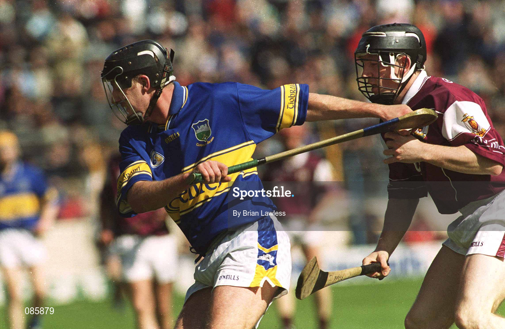 14 April 2002; Eddie Enright of Tipperary in action against Francis Forde of Galway during the Allianz National Hurling League Quarter-Final match between Galway and Tipperary at Semple Stadium in Thurles, Tipperary. Photo by Brian Lawless/Sportsfile
