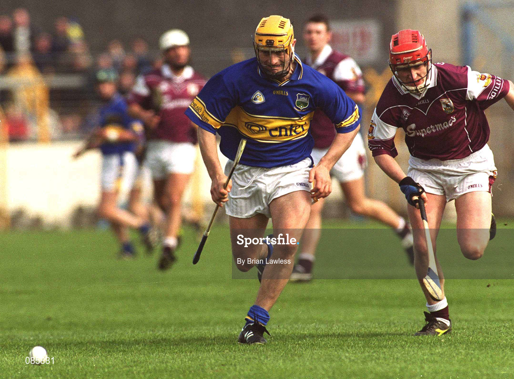 14 April 2002; Liam Cahill of Tipperary in action against Ollie Canning of Galway during the Allianz National Hurling League Quarter-Final match between Galway and Tipperary at Semple Stadium in Thurles, Tipperary. Photo by Brian Lawless/Sportsfile