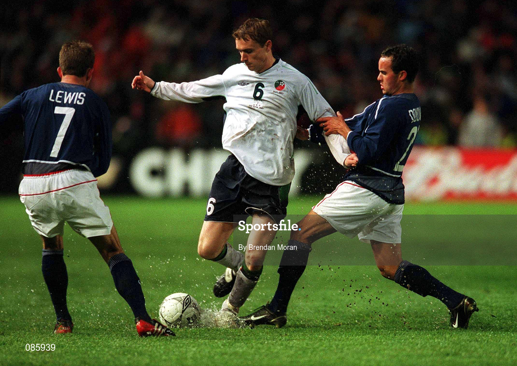 17 April 2002; Colin Healy of Republic of Ireland in action against Landon Donovan, right, and Eddie Lewis of USA during the International Friendly match between Republic of Ireland and USA at Lansdowne Road in Dublin. Photo by Brendan Moran/Sportsfile