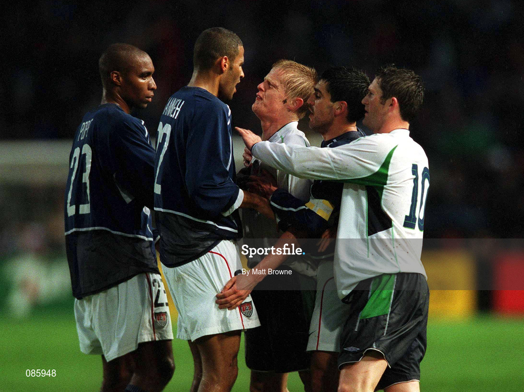 17 April 2002; Damien Duff, centre, has words with the USA's Tony Sanneh, second from left, during the International Friendly match between Republic of Ireland and USA at Lansdowne Road in Dublin. Photo by Matt Browne/Sportsfile