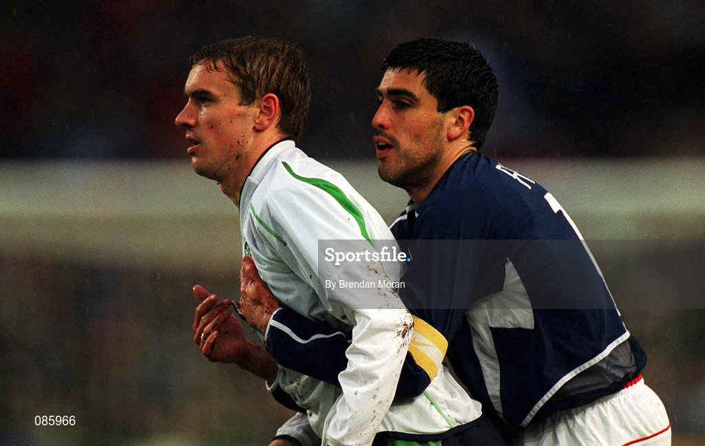 17 April 2002; Colin Healy of Republic of Ireland is held back by Claudio Reyna of USA during the International Friendly match between Republic of Ireland and USA at Lansdowne Road in Dublin. Photo by Brendan Moran/Sportsfile