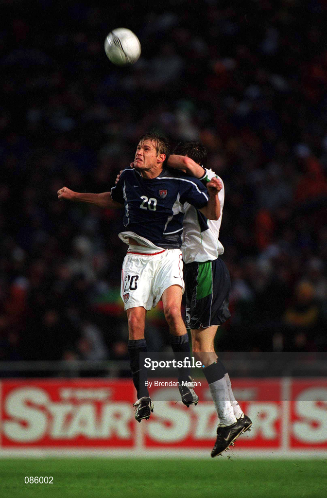 17 April 2002; Brian McBride of USA in action against Gary Breen of Republic of Ireland during the International Friendly match between Republic of Ireland and USA at Lansdowne Road in Dublin. Photo by Brendan Moran/Sportsfile