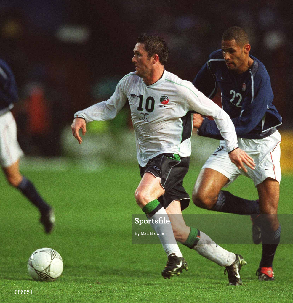17 April 2002; Robbie Keane of Republic of Ireland in action against Tony Sanneh of USA during the International Friendly match between Republic of Ireland and USA at Lansdowne Road in Dublin. Photo by Matt Browne/Sportsfile
