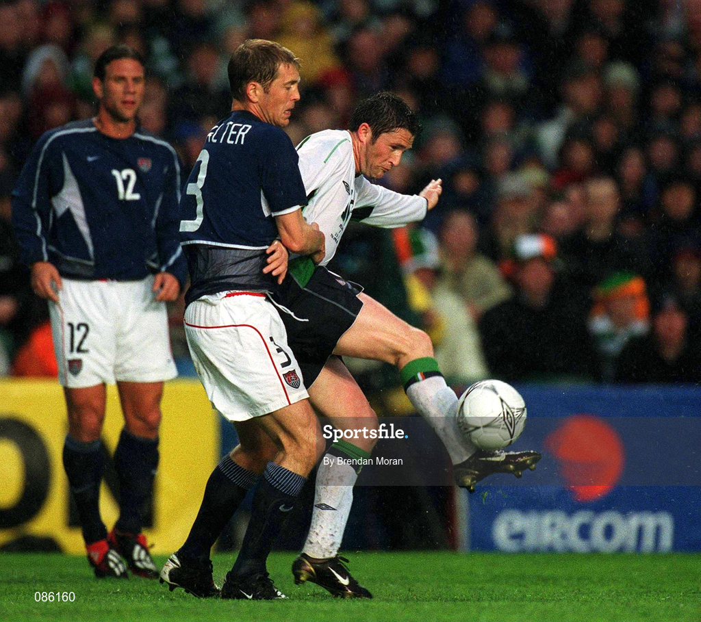 17 April 2002; Robbie Keane of Republic of Ireland in action against Gregg Berhalter of USA during the International Friendly match between Republic of Ireland and USA at Lansdowne Road in Dublin. Photo by Brendan Moran/Sportsfile