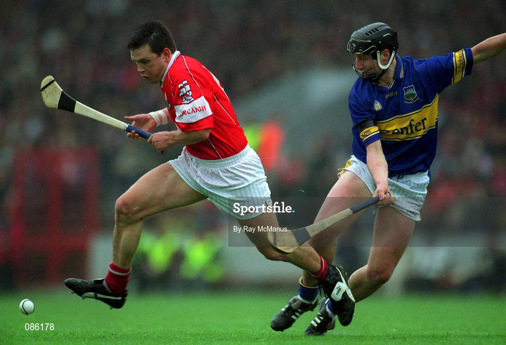 21 April 2002; Alan Browne of Cork in action against Philip Maher of Tipperary during the Allianz National Hurling League Semi-Final match between Cork and Tipperary at Páirc Uí Chaoimh in Cork. Photo by Ray McManus/Sportsfile
