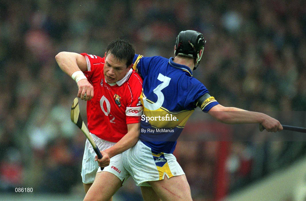 21 April 2002; Alan Browne of Cork in action against Philip Maher of Tipperary during the Allianz National Hurling League Semi-Final match between Cork and Tipperary at Páirc Uí Chaoimh in Cork. Photo by Ray McManus/Sportsfile