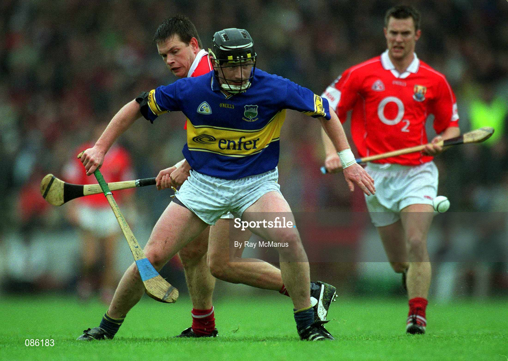 21 April 2002; David Kennedy of Tipperary in action against Alan Browne of Cork, left, during the Allianz National Hurling League Semi-Final match between Cork and Tipperary at Páirc Uí Chaoimh in Cork. Photo by Ray McManus/Sportsfile