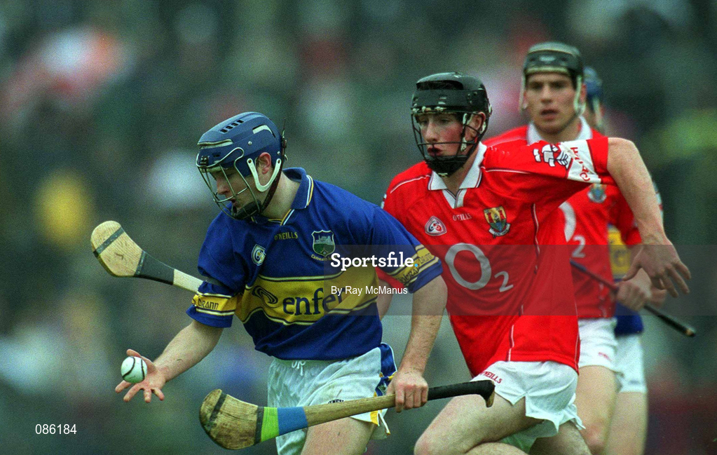 21 April 2002; Paul Kelly of Tipperary in action against Kieran Murphy of Cork during the Allianz National Hurling League Semi-Final match between Cork and Tipperary at Páirc Uí Chaoimh in Cork. Photo by Ray McManus/Sportsfile
