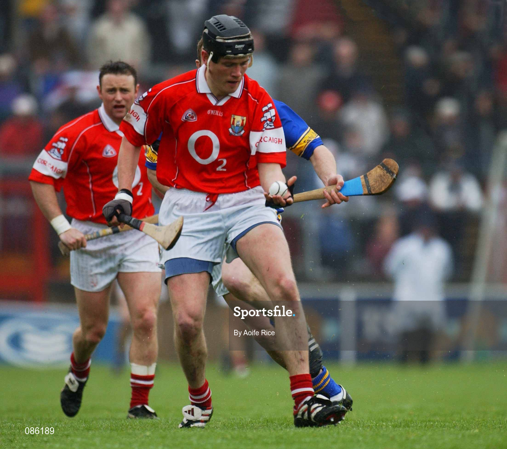 21 April 2002; John Browne of Cork in action against Conor Gleeson of Tipperary during the Allianz National Hurling League Semi-Final match between Cork and Tipperary at Páirc Uí Chaoimh in Cork. Photo by Aoife Rice/Sportsfile