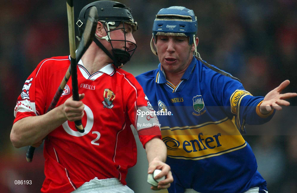 21 April 2002; Kieran Murphy of Cork in action against John Devane of Tipperary during the Allianz National Hurling League Semi-Final match between Cork and Tipperary at Páirc Uí Chaoimh in Cork. Photo by Aoife Rice/Sportsfile