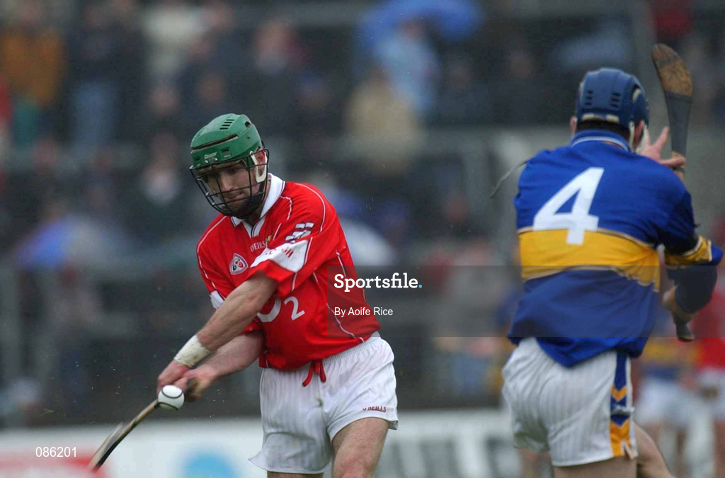 21 April 2002; Jerry O'Connor of Cork in action against John Devane of Tipperary during the Allianz National Hurling League Semi-Final match between Cork and Tipperary at Páirc Uí Chaoimh in Cork. Photo by Aoife Rice/Sportsfile