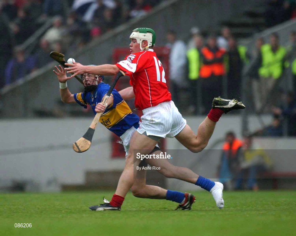 21 April 2002; Niall McCarthy of Cork in action against Benny Dunne of Tipperary during the Allianz National Hurling League Semi-Final match between Cork and Tipperary at Páirc Uí Chaoimh in Cork. Photo by Aoife Rice/Sportsfile