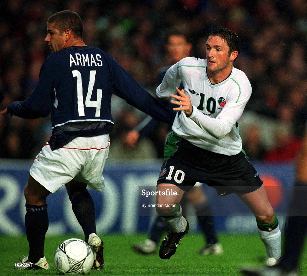 17 April 2002; Robbie Keane of Republic of Ireland in action against Chris Armas of USA during the International Friendly match between Republic of Ireland and USA at Lansdowne Road in Dublin. Photo by Brendan Moran/Sportsfile