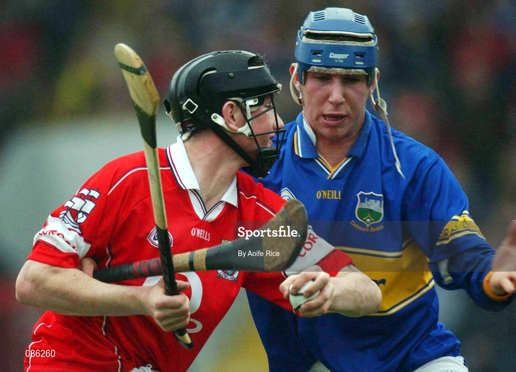 21 April 2002; Kieran Murphy of Cork in action against John Devane of Tipperary during the Allianz National Hurling League Semi-Final match between Cork and Tipperary at Páirc Uí Chaoimh in Cork. Photo by Aoife Rice/Sportsfile