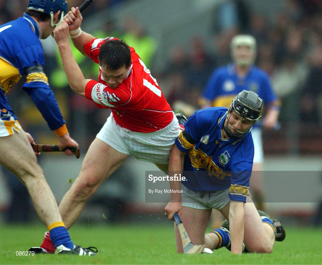 21 April 2002; Alan Browne of Cork in action against Philip Maher of Tipperary during the Allianz National Hurling League Semi-Final match between Cork and Tipperary at Páirc Uí Chaoimh in Cork. Photo by Ray McManus/Sportsfile