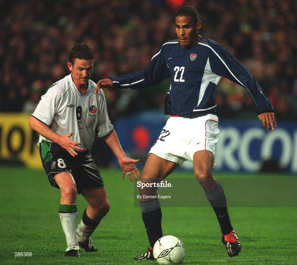 17 April 2002; Tony Sanneh of USA in action against Mark Kinsella of Republic of Ireland during the International Friendly match between Republic of Ireland and USA at Lansdowne Road in Dublin. Photo by Damien Eagers/Sportsfile
