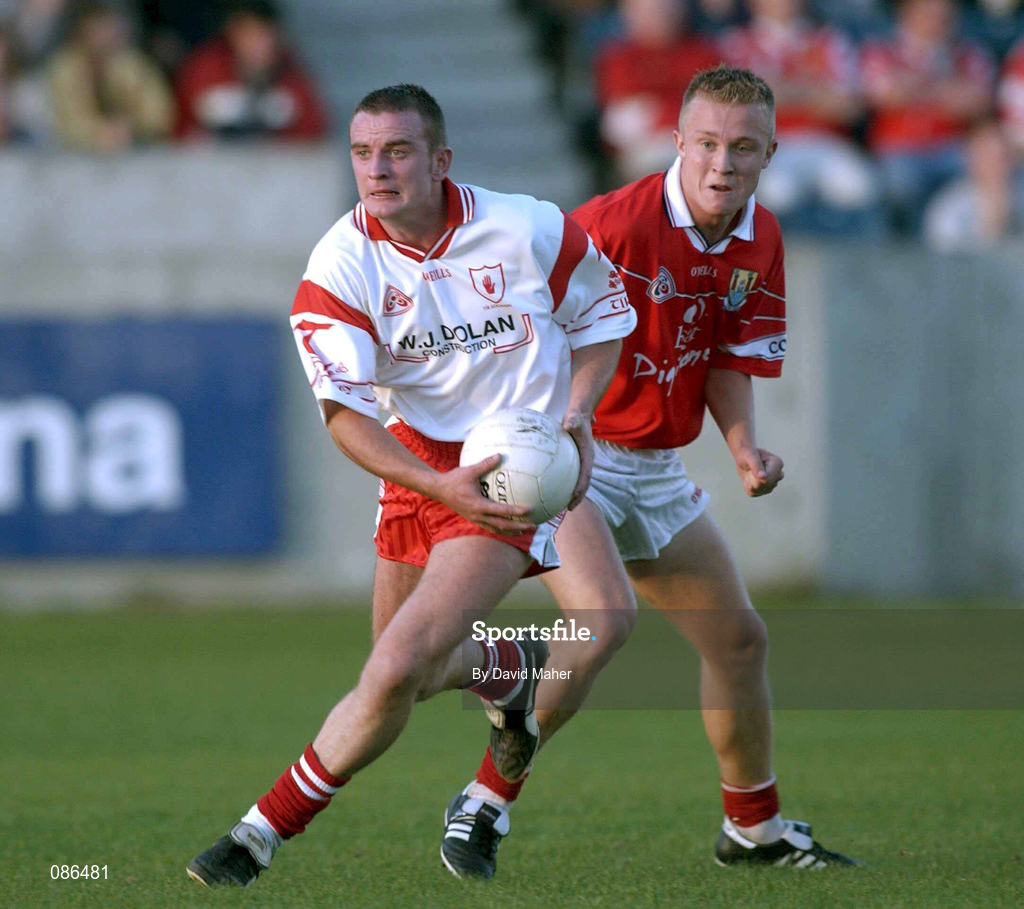 9 September 2001; Ciaran Meenagh of Tyrone in action against Conrad Murphy of Cork during the All-Ireland Under 21 Football Championship Semi-Final match between Tyrone and Cork at Parnell Park in Dublin. Photo by David Maher/Sportsfile