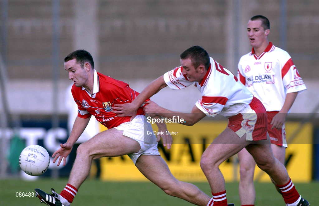 9 September 2001; Sean O'Brian of Cork in action against Ciaran Meenagh of Tyrone during the All-Ireland Under 21 Football Championship Semi-Final match between Tyrone and Cork at Parnell Park in Dublin. Photo by David Maher/Sportsfile