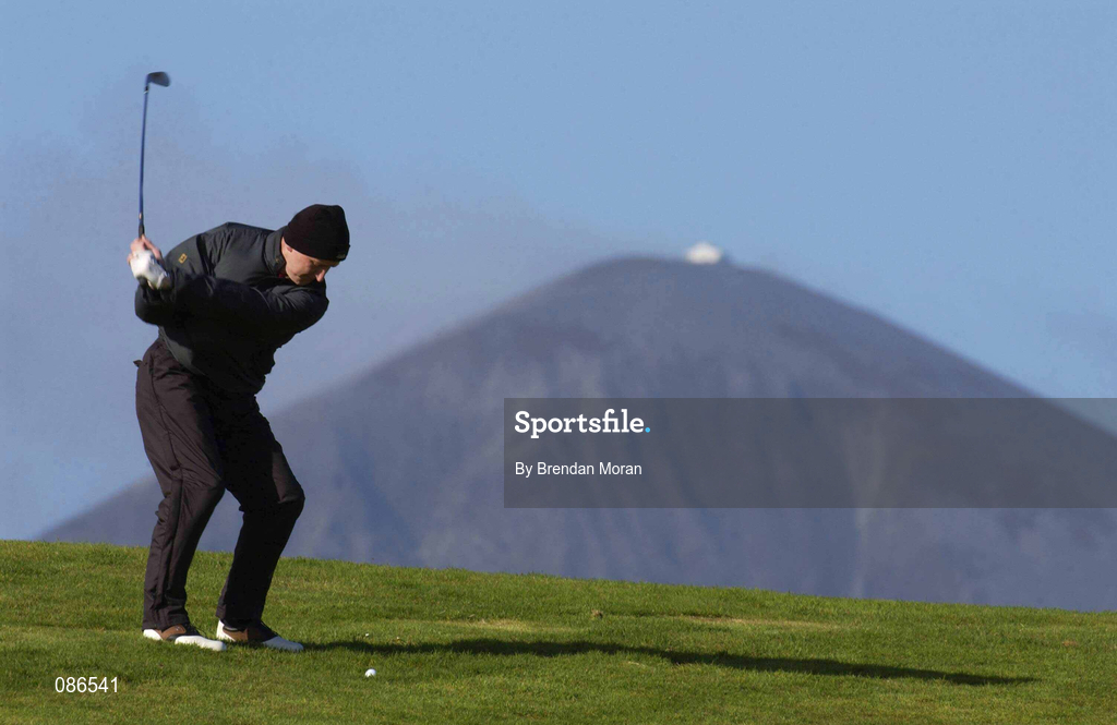 26 April 2002; Francis Howley plays his second shot to the 11th green in front of a backdrop of Croagh Patrick during day two of the Smurfit Irish PGA Championship at Westport Golf Club in Westport, Mayo. Photo by Brendan Moran/Sportsfile
