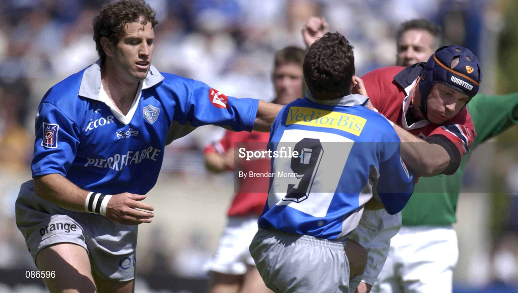 27 April 2002; Alan Quinlan of Munster in action against Alexandre Albouy, 9, and Ugo Mola of Castres during the Heineken European Cup Semi-Final match between Castres and Munster at Stade de la Mediterranie in Beziers, France. Photo by Brendan Moran/Sportsfile