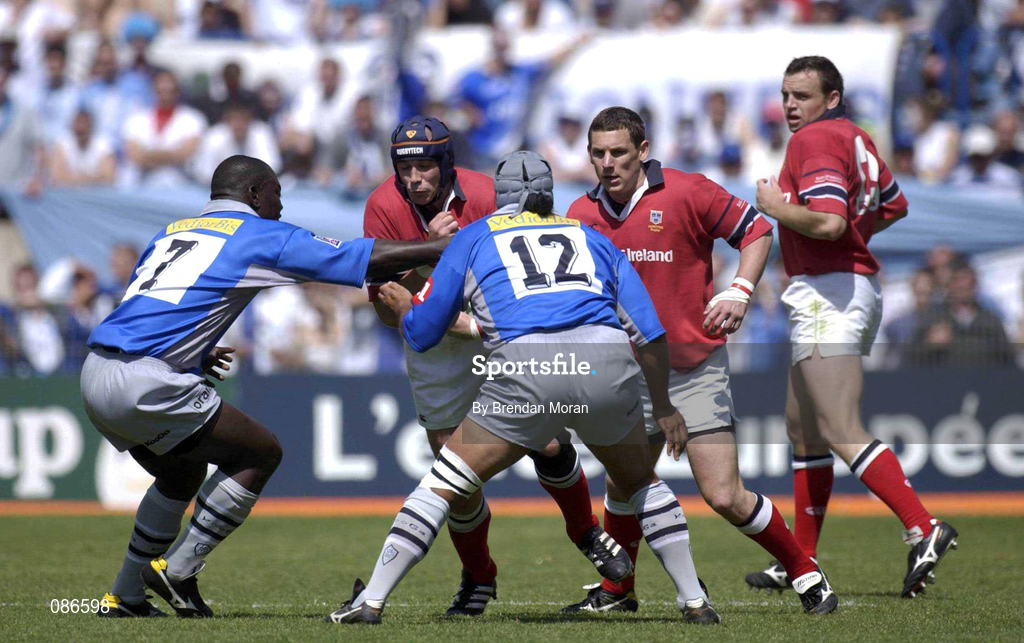 27 April 2002; Alan Quinlan of Munster supported by team-mate Jason Holland, in action against Isamelia Lassissi, left, and Norm Berryman of Castres during the Heineken European Cup Semi-Final match between Castres and Munster at Stade de la Mediterranie in Beziers, France. Photo by Brendan Moran/Sportsfile