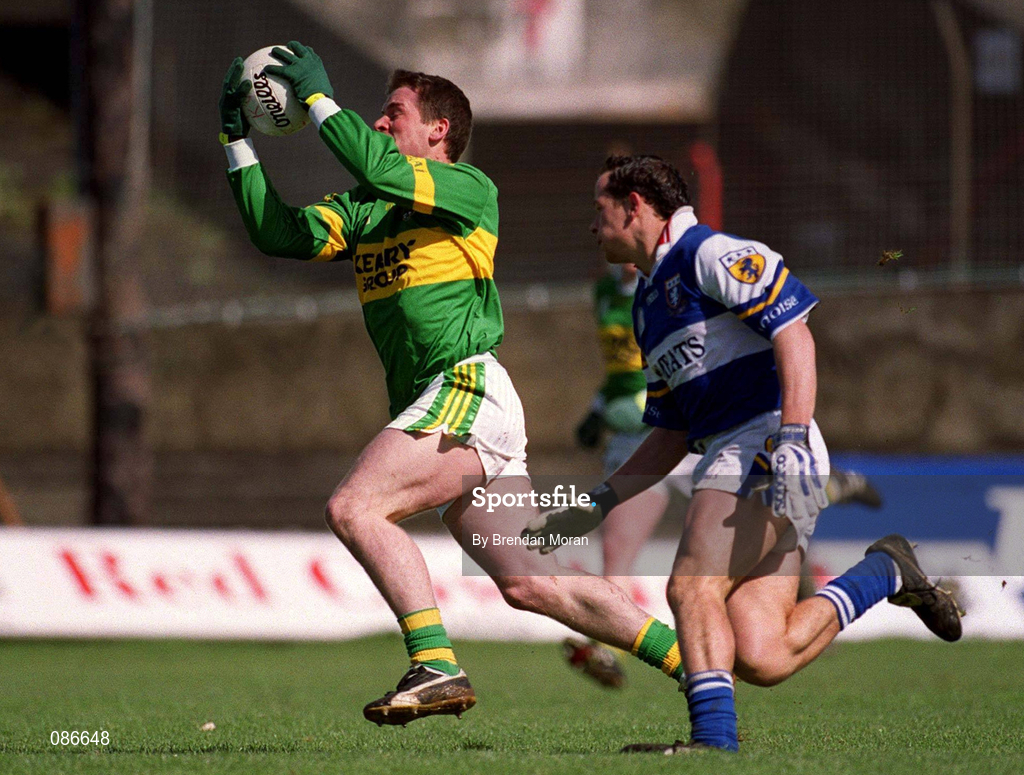 28 April 2002; Dara Ó Cinnéide of Kerry in action against Tom Kelly of Laois during the Allianz National Football League Division 2 Final match between Kerry and Laois at the Gaelic Grounds in Limerick. Photo by Brendan Moran/Sportsfile