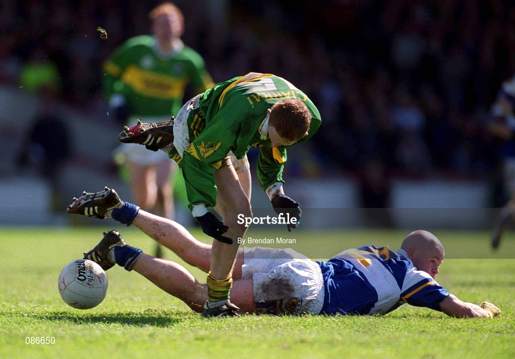 28 April 2002; Colm Cooper of Kerry in action against Pauraic Leonard of Laois during the Allianz National Football League Division 2 Final match between Kerry and Laois at the Gaelic Grounds in Limerick. Photo by Brendan Moran/Sportsfile