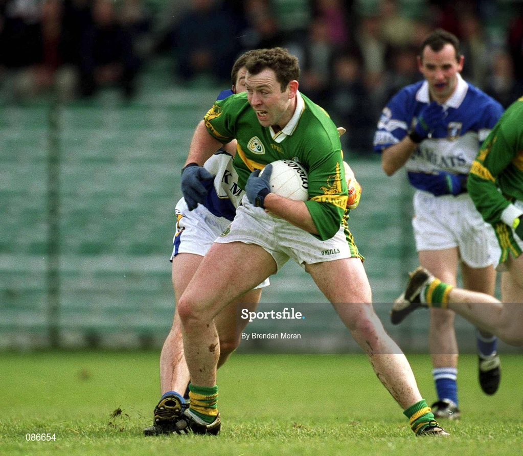 28 April 2002; Séamus Moynihan of Kerry is tackled by Ian Fitzgerald of Laois during the Allianz National Football League Division 2 Final match between Kerry and Laois at the Gaelic Grounds in Limerick. Photo by Brendan Moran/Sportsfile