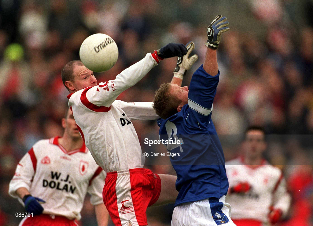 28 April 2002; Chris Lawn of Tyrone in action against Jason Reilly of Cavan during the Allianz National Football League Division 1 Final match between Tyrone and Cavan at St Tiernach's Park in Clones, Monaghan. Photo by Damien Eagers/Sportsfile