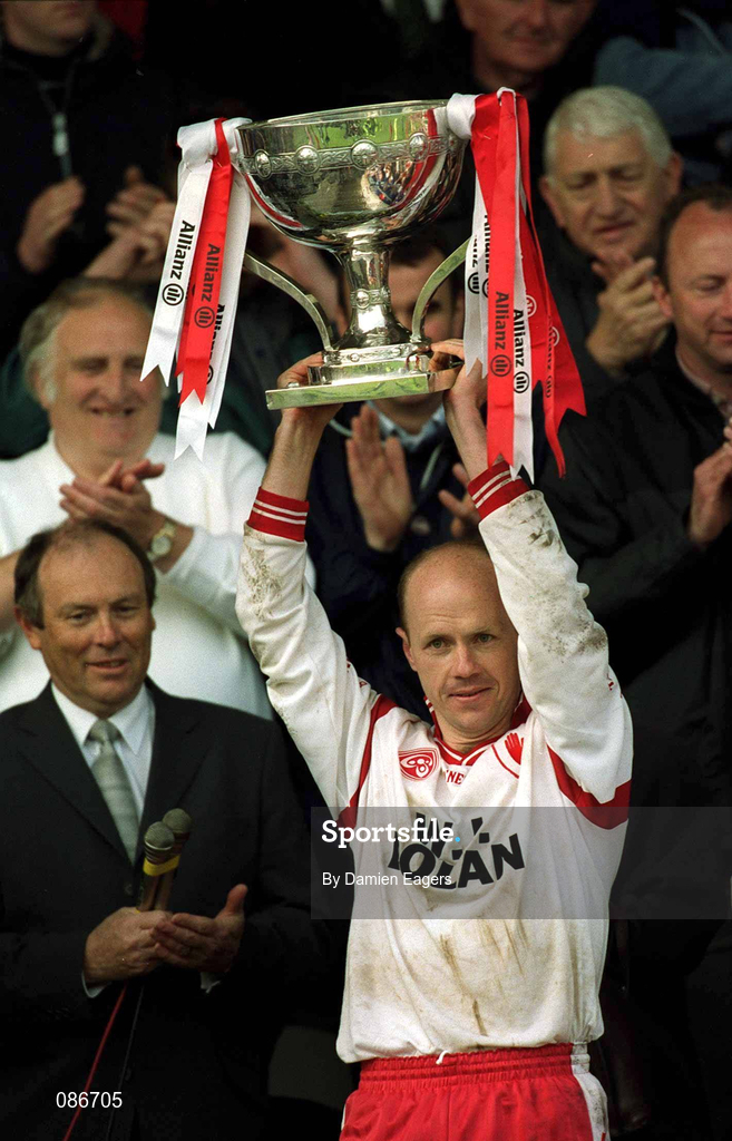 28 April 2002; Tyrone captain Peter Canavan lifts the cup after the Allianz National Football League Division 1 Final match between Tyrone and Cavan at St Tiernach's Park in Clones, Monaghan. Photo by Damien Eagers/Sportsfile