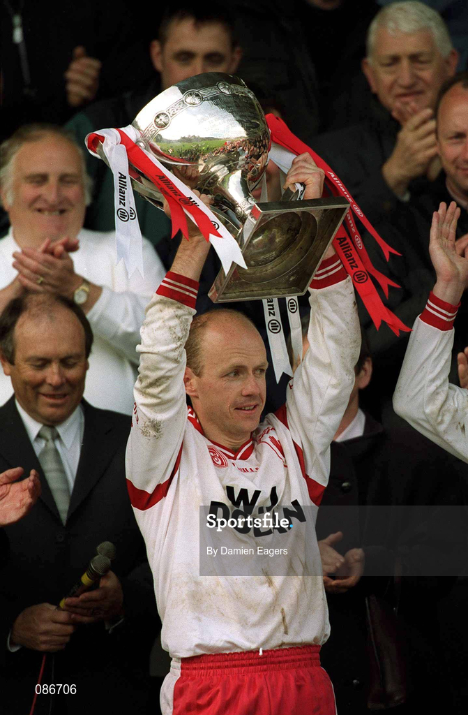 28 April 2002; Tyrone captain Peter Canavan lifts the cup after the Allianz National Football League Division 1 Final match between Tyrone and Cavan at St Tiernach's Park in Clones, Monaghan. Photo by Damien Eagers/Sportsfile