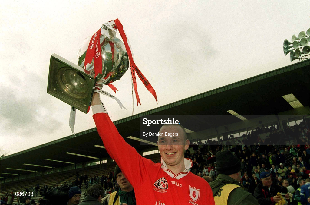 28 April 2002; Tyrone goalkeeper Peter Ward celebrates with the cup after the Allianz National Football League Division 1 Final match between Tyrone and Cavan at St Tiernach's Park in Clones, Monaghan. Photo by Damien Eagers/Sportsfile