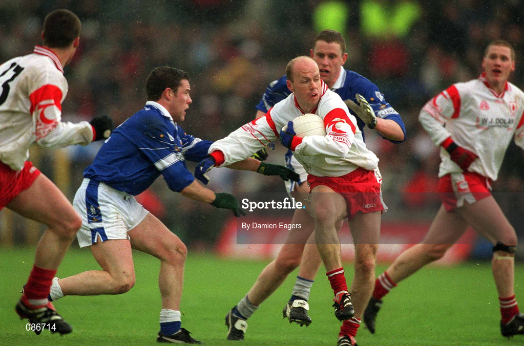 28 April 2002; Peter Canavan of Tyrone in action against Eamonn Reilly of Cavan during the Allianz National Football League Division 1 Final match between Tyrone and Cavan at St Tiernach's Park in Clones, Monaghan. Photo by Damien Eagers/Sportsfile