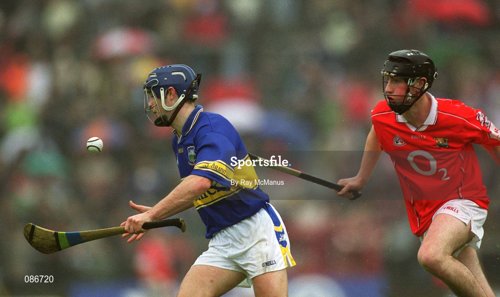 21 April 2002; Paul Kelly of Tipperary in action against Kieran Murphy of Cork during the Allianz National Hurling League Semi-Final match between Cork and Tipperary at Páirc Uí Chaoimh in Cork. Photo by Ray McManus/Sportsfile