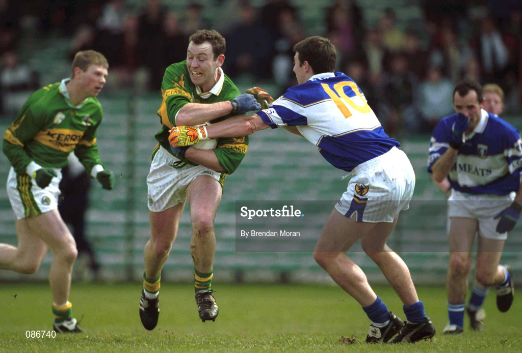 28 April 2002; Séamus Moynihan of Kerry is tackled by Ian Fitzgerald of Laois during the Allianz National Football League Division 2 Final match between Kerry and Laois at the Gaelic Grounds in Limerick. Photo by Brendan Moran/Sportsfile